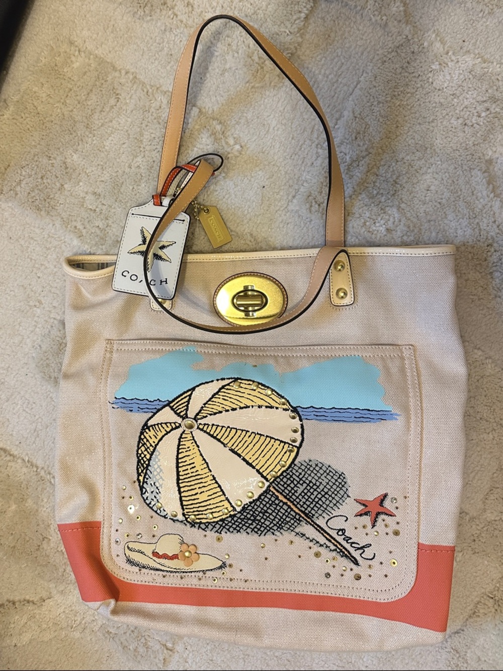 Coach Beige Canvas Tote with Coral Trim and Beach Umbrella Graphic